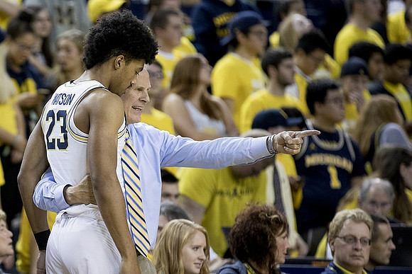 Ibi Watson (23) and John Beilein