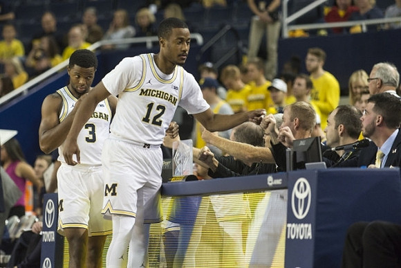 Zavier Simpson (3) and Muhammad-Ali Abdur-Rahkman (12)
