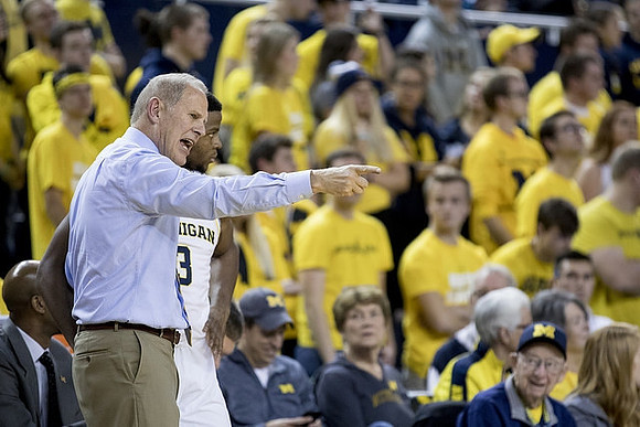 John Beilein and Zavier Simpson (3)