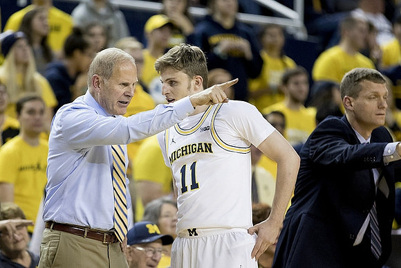 John Beilein, Luke Wilson (11), and Luke Yaklich