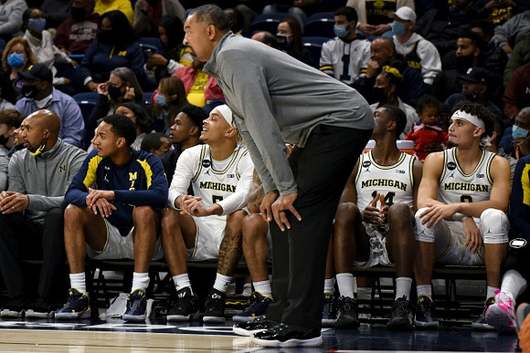 Juwan Howard and Michigan Team