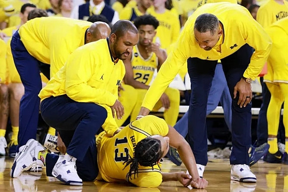 Jett Howard (13), Juwan Howard, and Jace Howard (25)