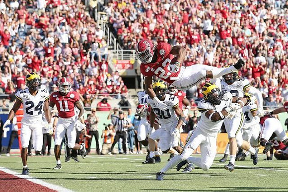Lavert Hill (24), Daxton Hill (30), Josh Metellus (14), and Jordan Glasgow (29)