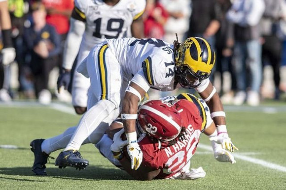 Kwity Paye (19) and Josh Metellus (14)