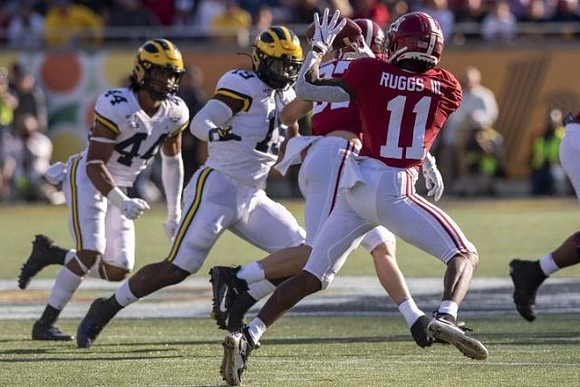 Cameron McGrone (44) and Kwity Paye (19)