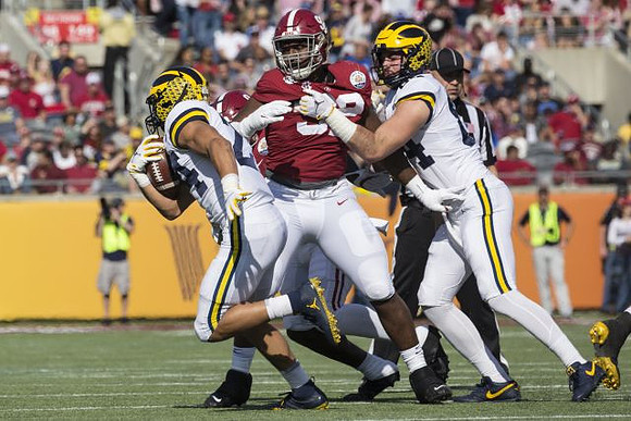 Zach Charbonnet (24) and Sean McKeon (84)