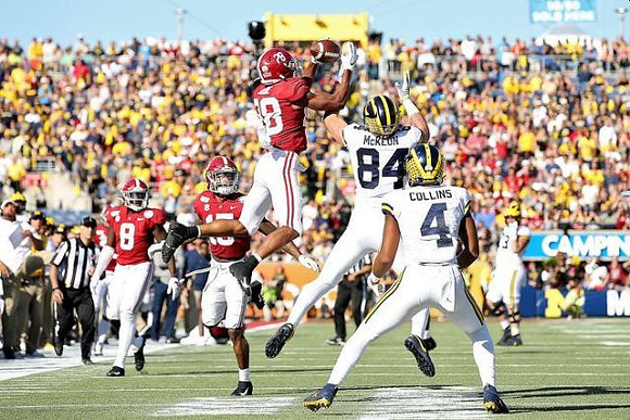 Sean McKeon (84) and Nico Collins (4)
