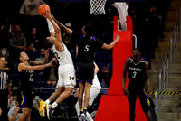 DeVante' Jones (12) and Hunter Dickinson (1)
