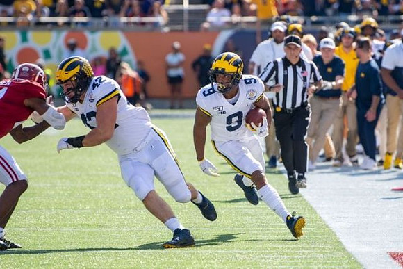 Ben Mason (42) and Donovan Peoples-Jones (9)