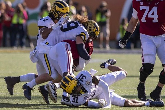 Josh Metellus (14), Jordan Glasgow (29), and Vincent Gray (31)