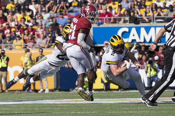 Hassan Haskins (25) and Shea Patterson (2)
