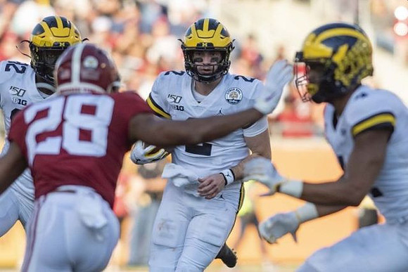 Nick Eubanks (82), Shea Patterson (2), and Nico Collins (4)