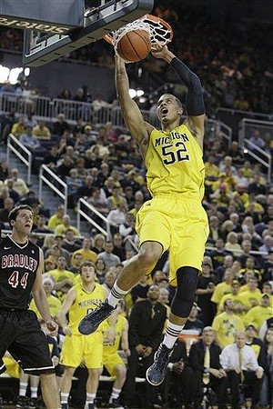 Jordan Morgan (52) and Zack Novak (0)