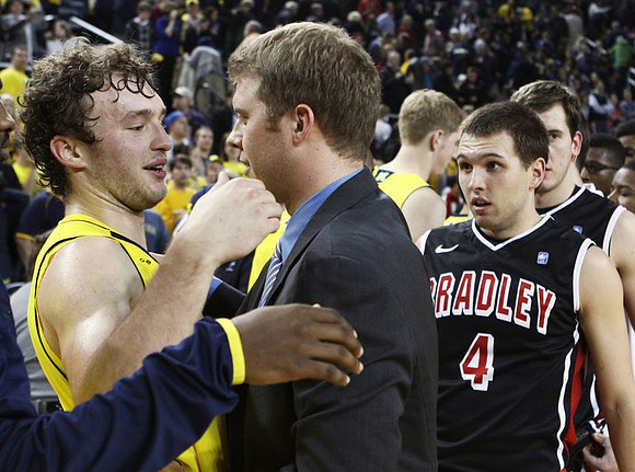 Zack Novak (0) and Patrick Beilein