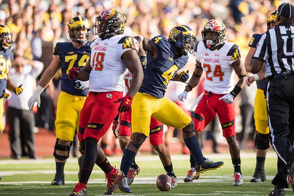 Ben Bredeson (74) and De'Veon Smith (4)