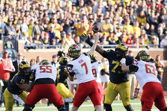 Chase Winovich (15) and Maurice Hurst (73)