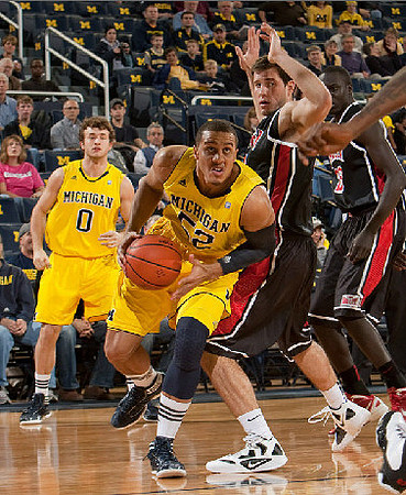 Jordan Morgan (52) and Zack Novak (0)
