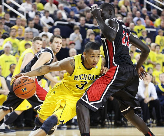 Trey Burke (3) and Stu Douglass (1)