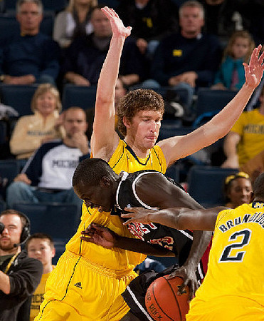 Evan Smotrycz (23) and Carlton Brundidge (2)