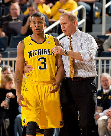 Trey Burke (3) and John Beilein