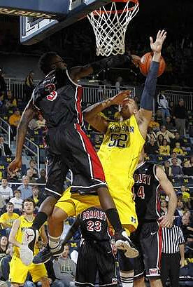 Jordan Morgan (52) and Zack Novak (0)