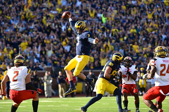 Wilton Speight (3) and Jake Butt (88)