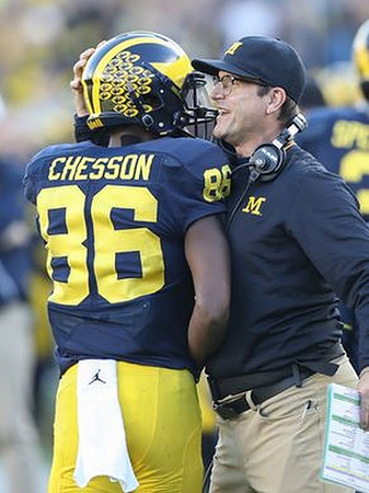 Jehu Chesson (86) and Jim Harbaugh