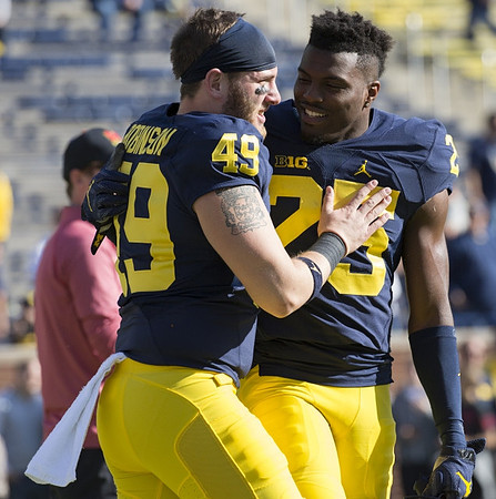 Andrew Robinson (49) and Dymonte Thomas (25)