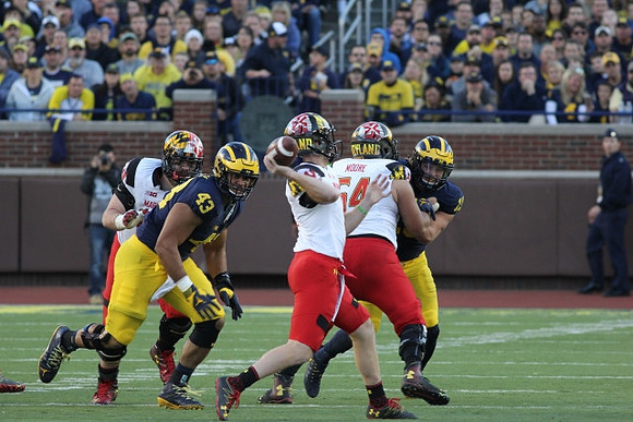 Chris Wormley (43) and Chase Winovich (15)