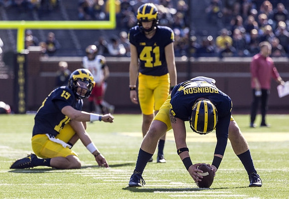 Garrett Moores (15), Ryan Tice (41), and Andrew Robinson (49)