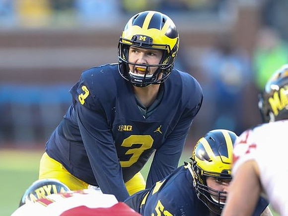 Wilton Speight (3) and Mason Cole (52)