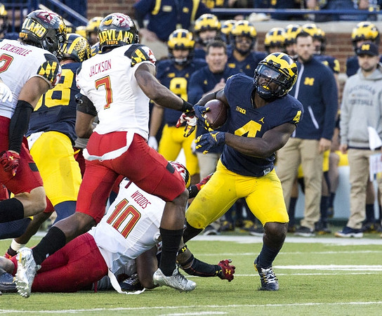 Jake Butt (88) and De'Veon Smith (4)