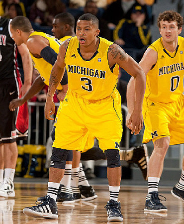 Trey Burke (3), Jordan Morgan (52), and Zack Novak (0)