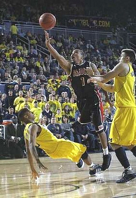 Stu Douglass (1) and Trey Burke (3)