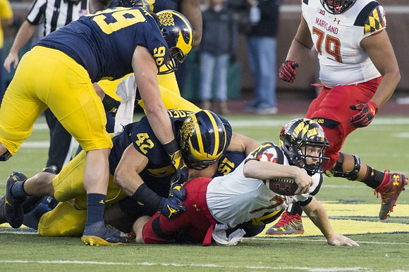 Matthew Godin (99), Ben Gedeon (42), and Chase Winovich (15)