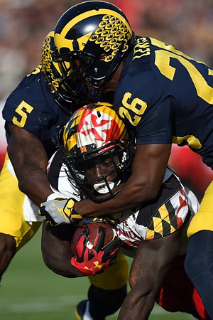 Jabrill Peppers (5) and Jourdan Lewis (26)