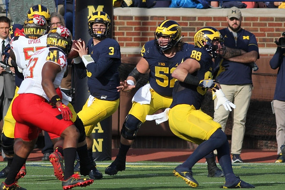 Wilton Speight (3), Mason Cole (52), and Jake Butt (88)