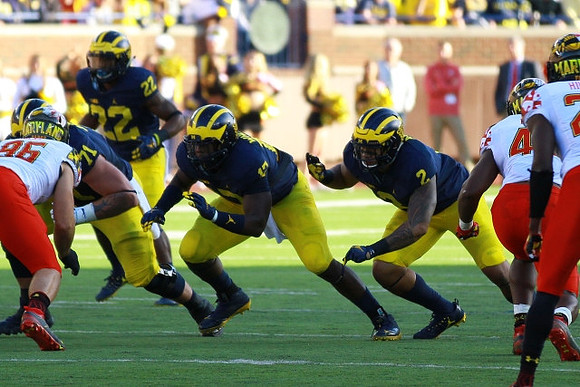 Ben Braden (71), Karan Higdon (22), Tyrone Wheatley Jr. (17), and Devin Asiasi (2)