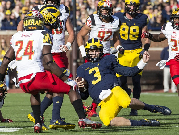 Wilton Speight (3) and Jake Butt (88)