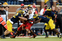 Ben Gedeon (42), Jabrill Peppers (5), and Jourdan Lewis (26)