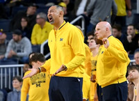Juwan Howard and Phil Martelli
