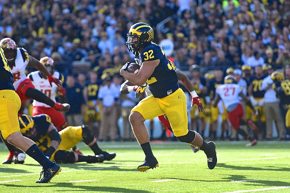 Kyle Kalis (67) and Ty Isaac (32)