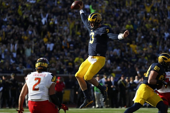 Wilton Speight (3) and Jake Butt (88)