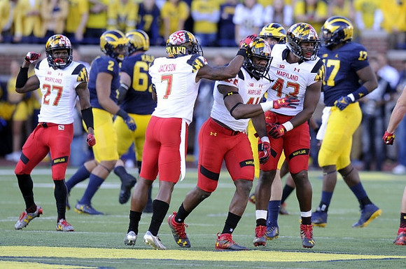 Devin Asiasi (2), Kyle Kalis (67), and Tyrone Wheatley Jr. (17)