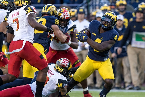 Jake Butt (88) and De'Veon Smith (4)