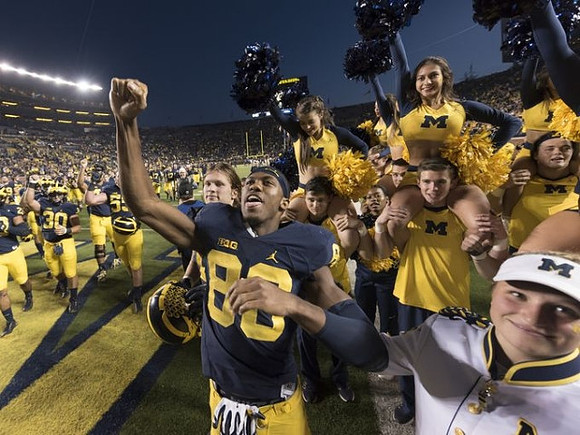 Jehu Chesson (86) and Michigan Team