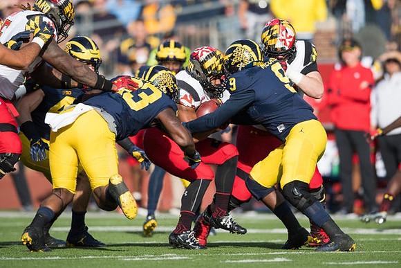 Taco Charlton (33) and Mike McCray (9)