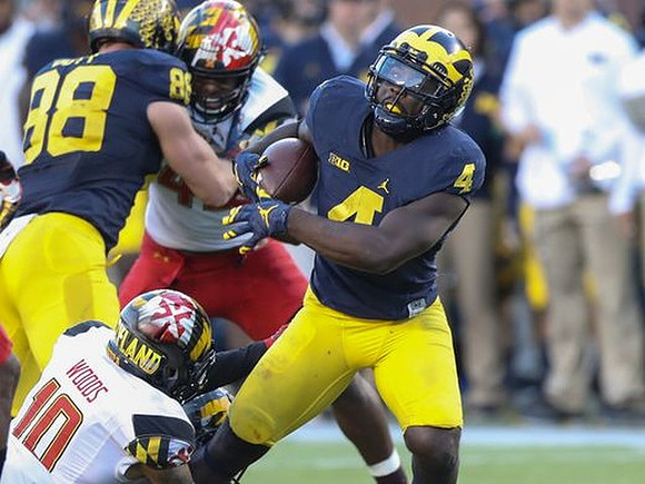 Jake Butt (88) and De'Veon Smith (4)