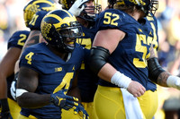 De'Veon Smith (4) and Mason Cole (52)