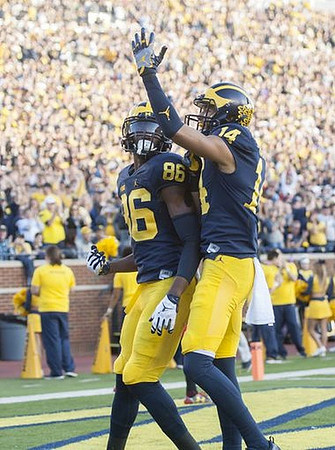 Jehu Chesson (86) and Drake Harris (14)